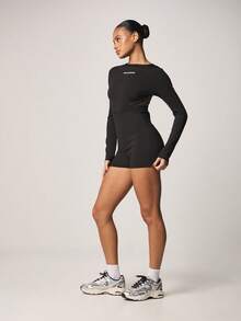 Missguided x Playboy Bộ áo liền quần thể thao tay dài, cổ tròn, có logo khoét lưng, kiểu quần short thể thao, thích hợp cho lối sống năng động. - màu đen - Xem 3