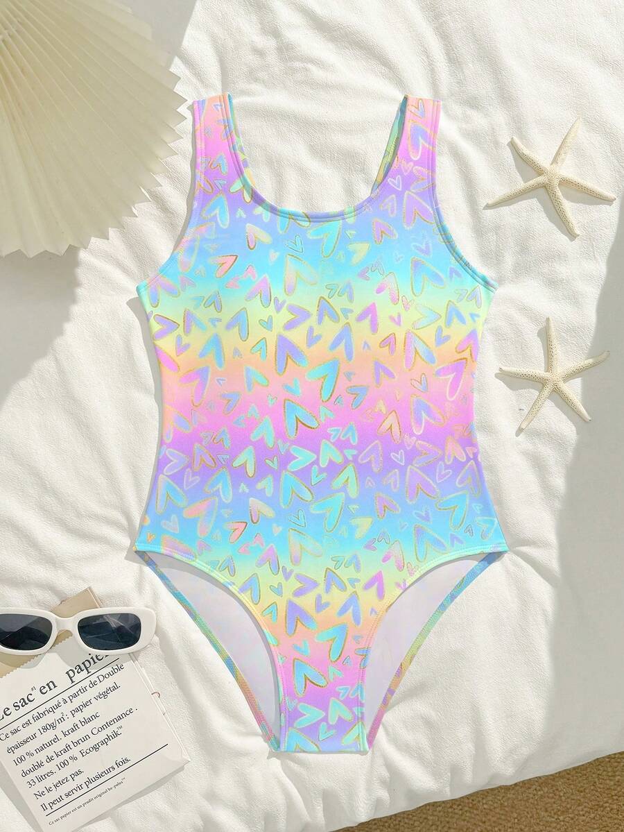 SHEIN Traje de baño de una pieza con degradado de corazón arcoíris para niñas de 8 a 12 años, traje de baño kawaii brillante holográfico para adolescentes, traje de baño para vacaciones en la playa para estudiantes