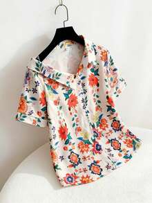 Franclia Áo kiểu nữ tay ngắn cổ lệch dáng thời thượng năm 2026 - Họa tiết hoa trừu tượng, cài cúc phía trước, kiểu dáng tối giản dễ mặc, phù hợp cho công sở, du lịch hoặc nghỉ dưỡng. - Nhiều màu - Xem 5