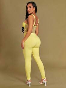 Radiana Bộ jumpsuit dài ôm sát cơ thể màu vàng nhạt, co giãn cao, không lưng, thích hợp cho khách mời dự đám cưới mùa xuân/hè hoặc ngày Valentine, trang trí bằng kim loại. - Màu vàng ngỗng - Xem 2