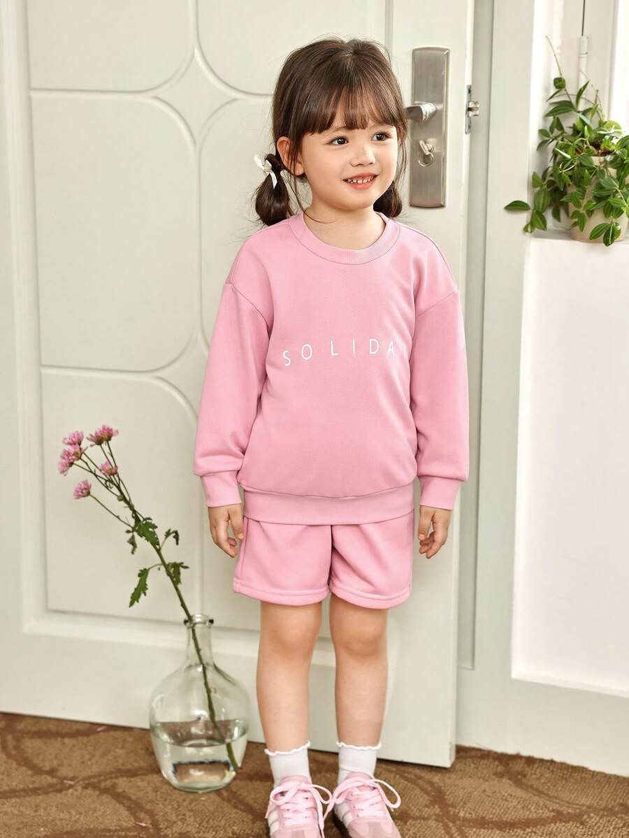 SHEIN Genkimix Kids Bộ 2 áo nỉ cổ tròn tay dài trang trí nơ màu mơ và quần ống loe kaki cho bé gái, trang phục thường ngày thời trang cho mùa xuân/thu - Hồng - Xem 1