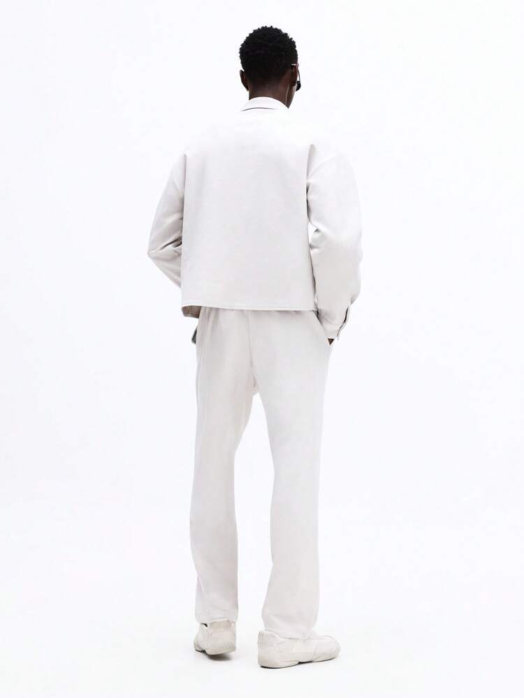 Conjunto de camisa abotonada y pantalones holgados