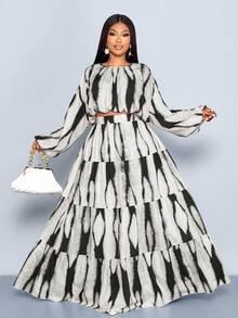 SOLERSUN 大码女装日常休闲宽松优雅通勤套装，黑色和杏色印花，圆领落肩袖，弹性袖口长袖上衣搭配褶裥高腰A字多层半裙，梭织半裙套装两件套（随机花朵图案），春季面料，长款半裙套装，日常百搭半裙，秋冬季 - 杏色 - 查看 3