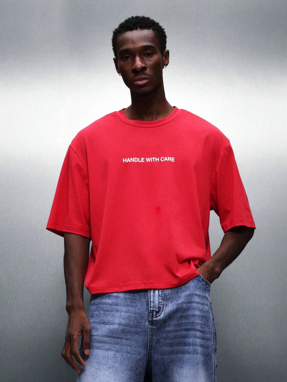 PLAYBOY X SUMWON Cropped Fit Graphic Tee With Script Logo And Handle With Care Text Print Short Sleeve Red Cotton