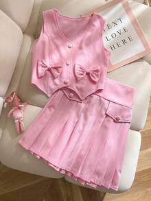 Elladie kids 少女时尚都市通勤蝴蝶结装饰不对称下摆无袖露脐背心搭配粉色百褶迷你裙套装，春夏装