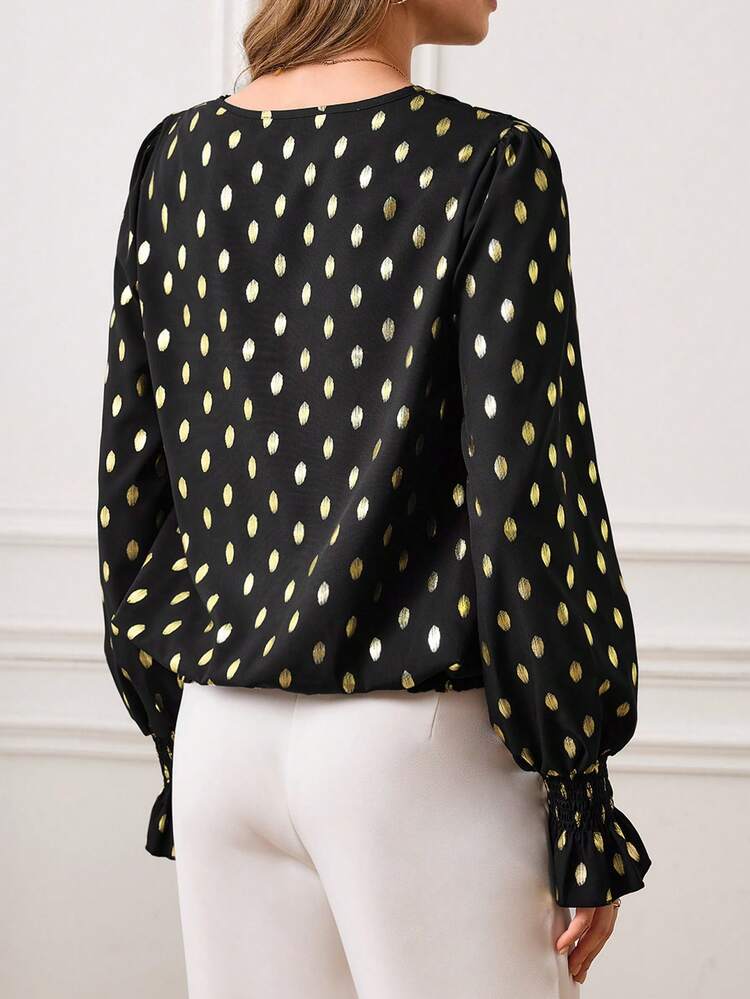 This Elegant Women's Blouse Features A Black Background With Gold Polka Dots, Exuding A Luxurious Sheen That Perfectly Complements The Vibrant Atmosphere Of The New Year. The V-Neck And Gathered Waist Design, Paired With Flared Sleeves, Create A Slimming And Stylish Silhouette. The Classic Black Base Is Accented With Gold Polka Dots For A Bright And Eye-Catching Look. Suitable For Spring And Autumn, It Can Be Paired With White Trousers Or A Skirt For A Sophisticated New Year's. Perfect For Various Occasions, From Work Commutes To Casual Gatherings, This Blouse Showcases A Polished And Stylish Look At Work While Also Making A Statement At Smaller Parties With Its Dazzling Gold Polka Dots. It's A Sophisticated And Festive Piece To Add To Your New Year's Wardrobe.