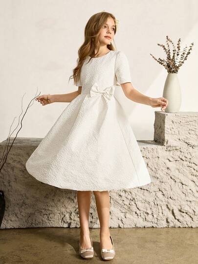 Tween Girls' High-End Jacquard Round Neck Rhinestone Chain Short Sleeve Bow Front Pleated Short Dress, Suitable For Wedding, Prom, Birthday Party, Banquet Teen Girl Dresses Midi White Formal Dress For Teens Midi Dress For Teens White Modest Dress For Tweens