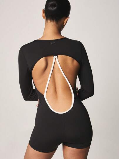 Missguided x Playboy Long Sleeve Logo Cut-Out Back Athletic Shorts Romper With Crew Neckline For Active Lifestyle