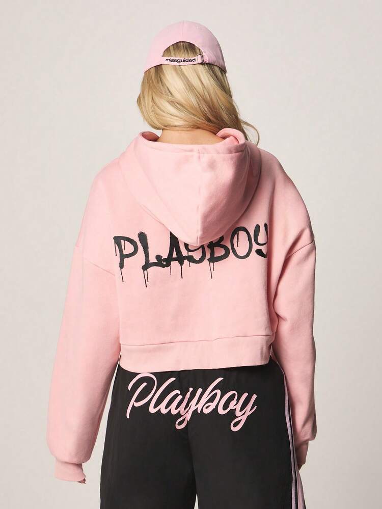 Missguided x Playboy Sudadera con capucha corta y cremallera delantera con estampado gráfico de logo de conejo y estilo urbano de moda callejera