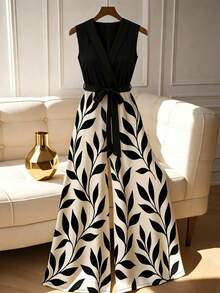 GlowEve CURVE Plus Size Sleeveless Jumpsuit With Plant Print And Waist Tie, Round Neck Leaf Print Dress Black And White Maxi Dress Elegant Maxi Dress Sleeveless Maxi Dress Belted Maxi Dress Black And White Floral Dress - Multicolor - View 1