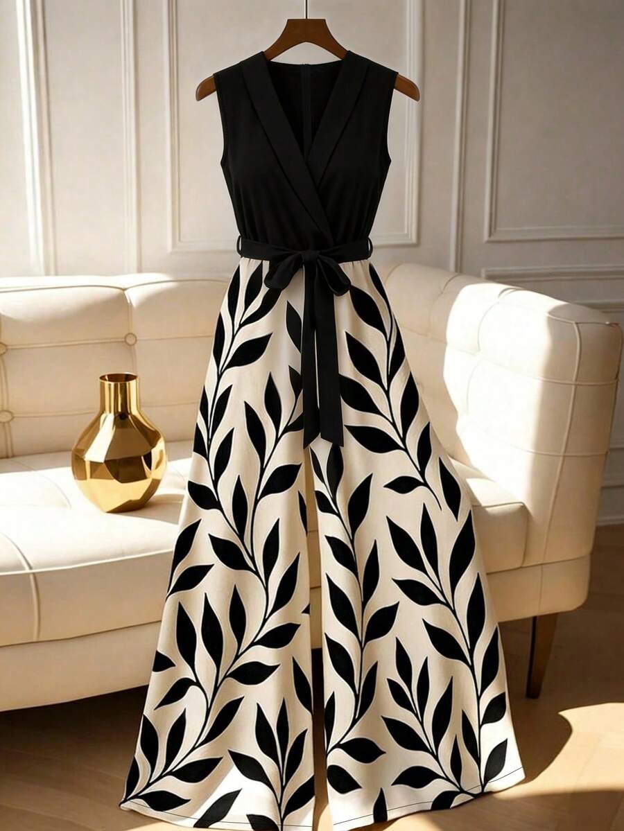 GlowEve CURVE Plus Size Sleeveless Jumpsuit With Plant Print And Waist Tie, Round Neck Leaf Print Dress Black And White Maxi Dress Elegant Maxi Dress Sleeveless Maxi Dress Belted Maxi Dress Black And White Floral Dress - Multicolor - View 1