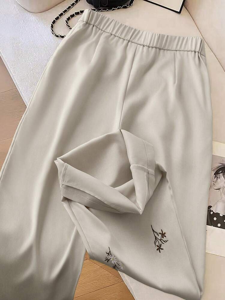 Modelyn Pantalones casuales con bolsillos en diagonal y bordado floral para mujer - Caqui - Añade 2