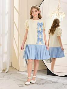 1 Pezzo Vestito Vintage Morbido e Carino per Ragazze Primavera/Estate, Collo Equipaggio Bianco con Maniche a Palloncino e Maniche Corte, Caratteristiche Fiocchi Tridimensionali, Vestito Plissettato Lunghezza Ginocchio, Perfetto per Uso Quotidiano, Scuola e Uscite delle Ragazze - Albicocca - Visualizzare 3
