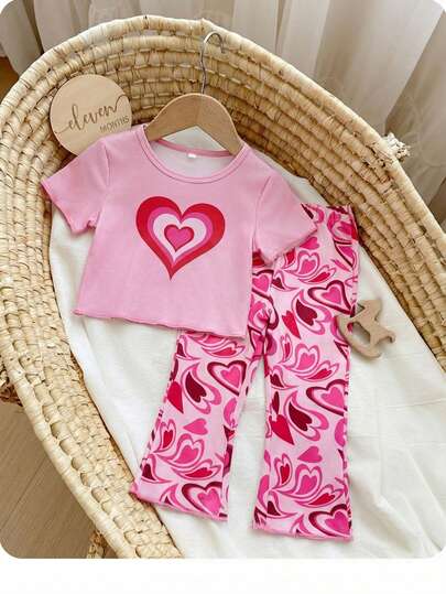 SHEIN Conjunto de top de manga corta de punto de rayas coloridas y pantalones de cintura elástica, estilo casual y versátil para bebé niña en verano