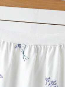 Modelyn Chân váy nữ thanh lịch in hoa, xếp ly ở gấu váy. - trắng - Xem 3