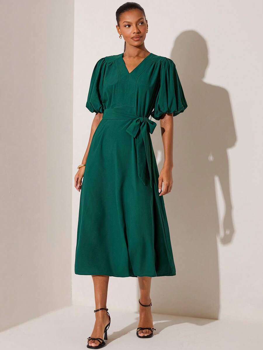 Lilora Damen einfarbiges Kleid mit V-Ausschnitt, kurzen Puffärmeln, Taillenbindung und eleganter Knielänge - Grün - Übersicht 1