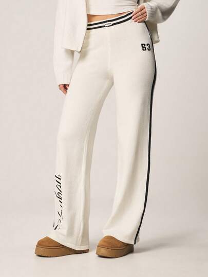 Missguided x Playboy Cream Knitted Wide Leg Pants With Contrast Black Side Stripe And Varsity Number Print Detail For Casual Comfort