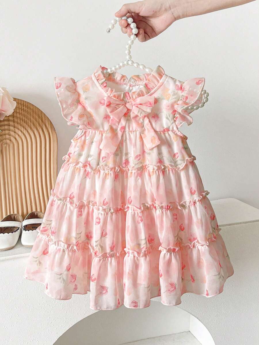 SHEIN Đầm xòe họa tiết hoa, nơ trang trí, kiểu dáng thường ngày cho bé gái, thích hợp mặc mùa xuân, hè, thu, ở nhà, đi nghỉ mát, dự tiệc và mặc hàng ngày. - Nhiều màu - Xem 1