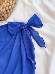 Bộ đồ bơi liền thân in hoa màu xanh dương và trắng dành cho thiếu nữ, có nơ trang trí và váy che ngoài, trang phục đi biển thường ngày. - Xanh và trắng - Xem 7