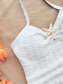 Áo tắm liền thân màu trắng dệt kim ôm sát, kiểu dáng yếm buộc cổ chữ V, trang trí tua rua hình sao biển và vỏ sò bằng kim loại, dành cho bé gái tuổi teen, thích hợp đi nghỉ mát. - trắng - Xem 4