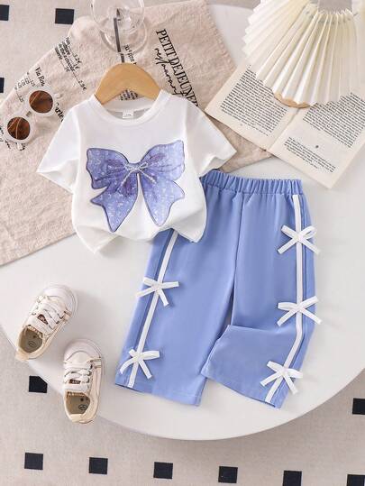 SHEIN Cute Baby Girls Multicolor Round Neck Short Sleeve Tee And Pants Set With Graphic Bow & Ribbons Stylish Baby Girls Regular Sleeve Tee And Pants Outfit With Cute Graphic Print And Side Ribbons Nueva Moda Ss26sets