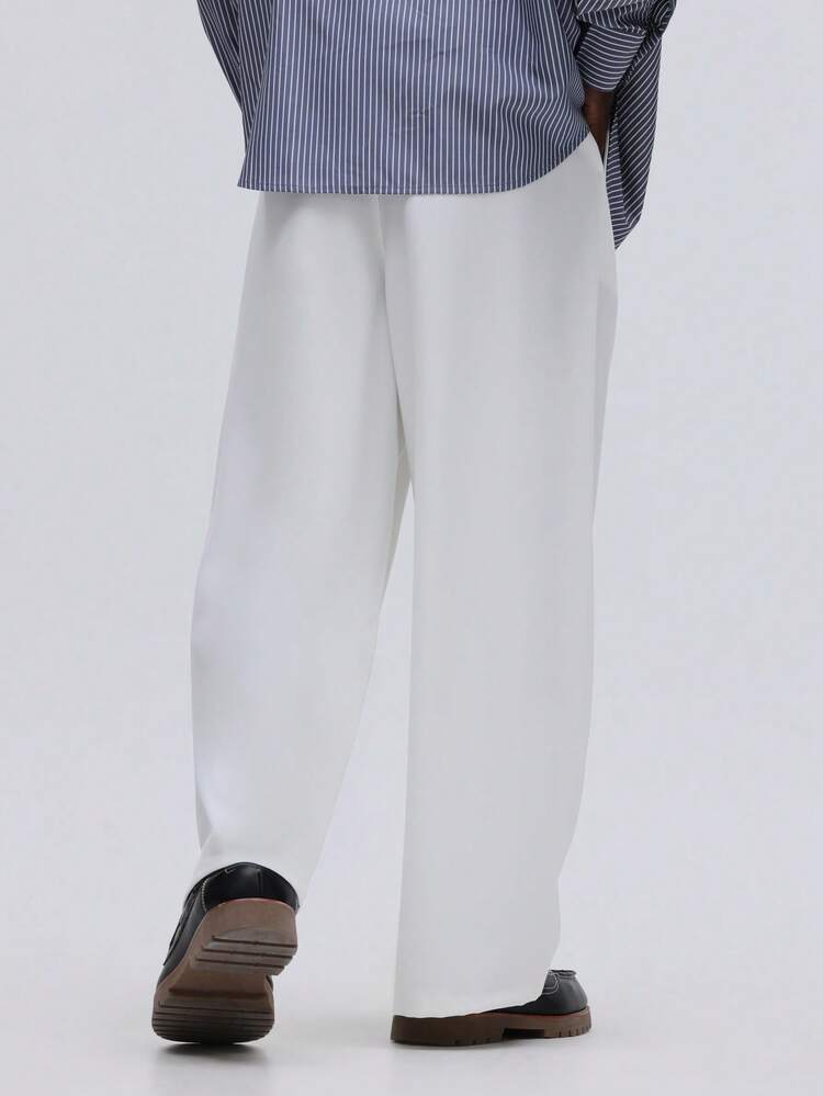 Pantalon de costume à jambes larges avec poches latérales