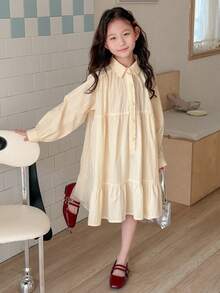 Dazy Kids Đầm dài tay màu trơn cho bé gái tuổi teen, cài cúc phía trước, vạt bèo nhún. - Màu vàng - Xem 8