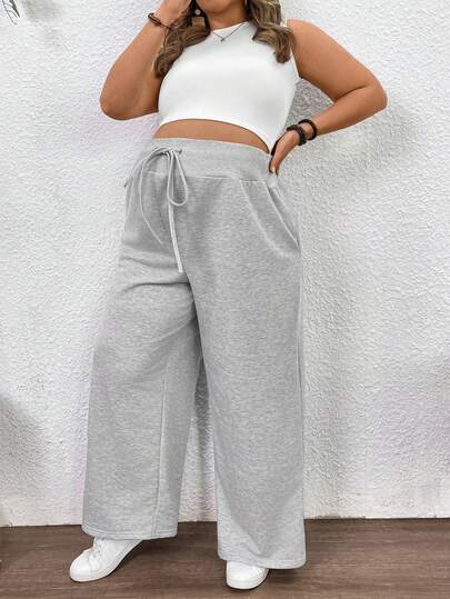 SHEIN Pantalones casuales de maternidad de talla grande con bolsillo de giro y unicolor