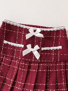 SHEIN Sparklyn 这是一套女童套装，包含两件单品：一件适合少女的短款粗花呢外套和一条饰有蝴蝶结的裙子。非常适合秋季穿着。 - 酒紅色 - 查看 6