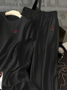 Resyla 女士字母樱桃印花圆领短袖荷叶边T恤和阔腿裤休闲两件套 - 黑色 - 查看 3