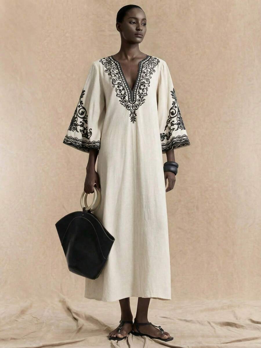 Ontre Nuevo vestido largo de verano para mujer 2026SS, unicolor, de moda, adecuado para el verano. Vestido largo suelto y cómodo de color avena con patrón bordado negro, estilo bohemio, manga acampanada, cuello en V, adecuado para fiestas, vacaciones, resort de isla, festivales de música, temporada de verano - Blanco - Ver 1