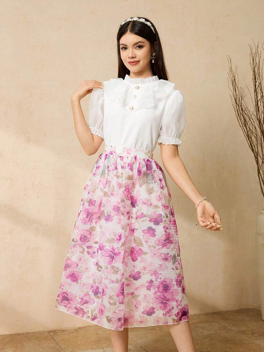 Bộ đồ thanh lịch, duyên dáng gồm áo tay phồng màu trắng và chân váy xếp ly eo in hoa, dành cho thiếu nữ. - Hồng - Xem 1