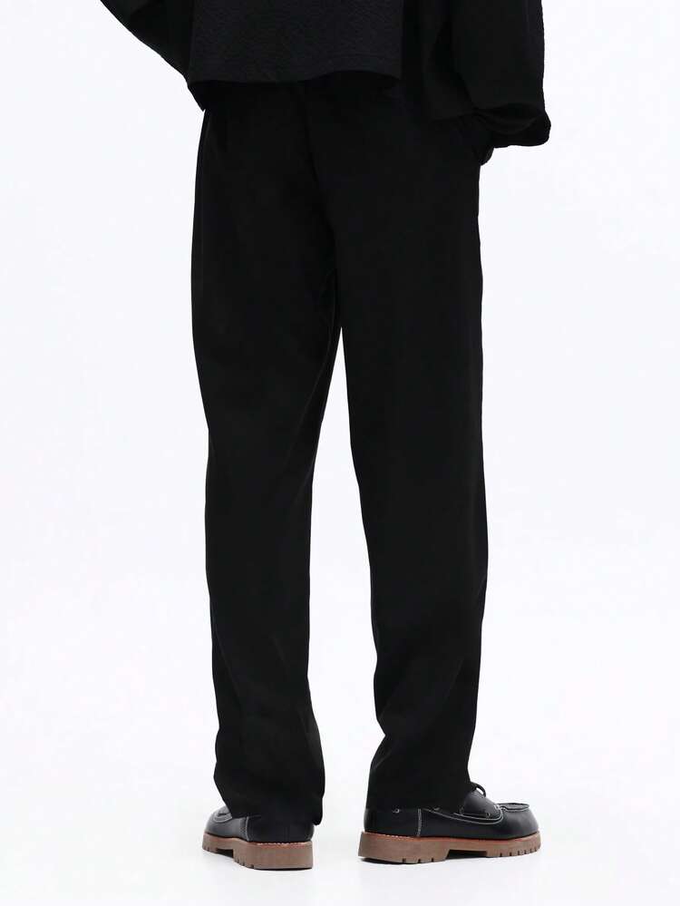 Weit geschnittene Anzughose mit Knopfdetails