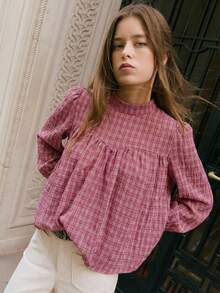 Nöista 这款格子衬衫采用优雅的高领设计、蓬松的袖子和宽松的廓形，为女性春假提供了一个别致而精致的选择，非常适合打造精致的日常造型、优雅的派对装扮、节日生日装扮以及充满春日气息的时尚造型。 - 粉色 - 查看 10