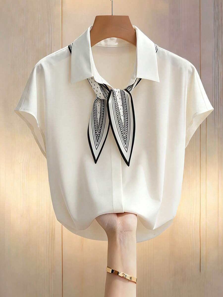 Franclia Blusa de gasa con cuello en V y estampado de murciélago, casual y versátil, color beige, manga corta, corte holgado, adecuada para primavera/verano - Caqui - Ver 1