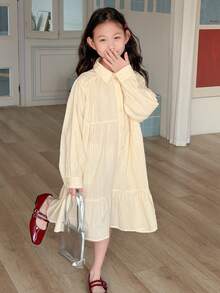 Dazy Kids Đầm dài tay màu trơn cho bé gái tuổi teen, cài cúc phía trước, vạt bèo nhún. - Màu vàng - Xem 5