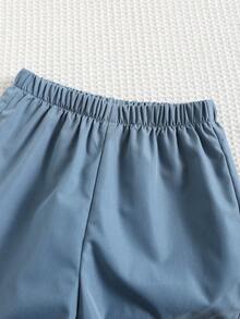 SHEIN 两件套：男童卡通兔子图案 Polo 领短袖开衫和纯色短裤，适合外出、上学、春夏、复活节等场合。 - 彩色 - 查看 7