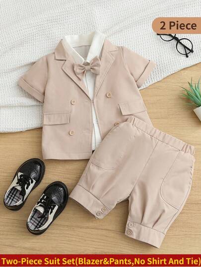 2pcs Baby Boy Gentleman Suit Set, Including Decorative Pocket Double-Breasted Short Sleeve Blazer Jacket And Elastic Waist Button Cuff Shorts, No Shirt And Bowknot, Fashionable Little Gentleman Outfit, Suitable For Family Gatherings, Birthday Parties, Dinners, Performances, Christenings, 1st Birthday Celebrations, Weddings, Baby Showers, Ring Bearer, Summer