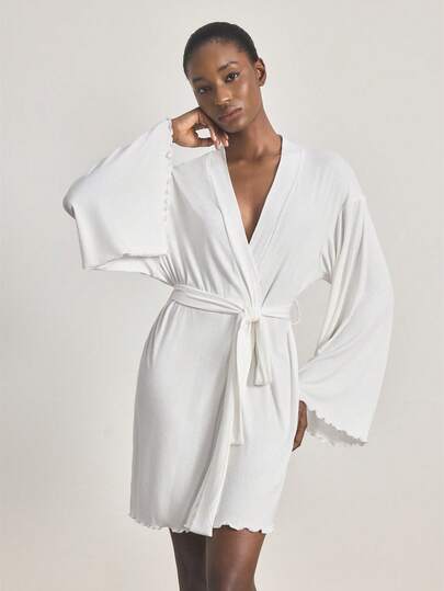 Ocili Dambadrock med långa ärmar och nedsänkta axlar i enfärgad