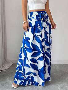 Elenzga 这款女士优雅高腰系带蓝色印花半身裙，尽显精致优雅。适合各种场合，从正式工作装和通勤装，到性感装扮、浪漫法式风、休闲外出、度假、中东复古主题活动、温馨下午茶聚会、魅力派对，以及新年、感恩节、圣诞节、情人节和其他节日庆祝活动。 - 藍白色 - 查看 5