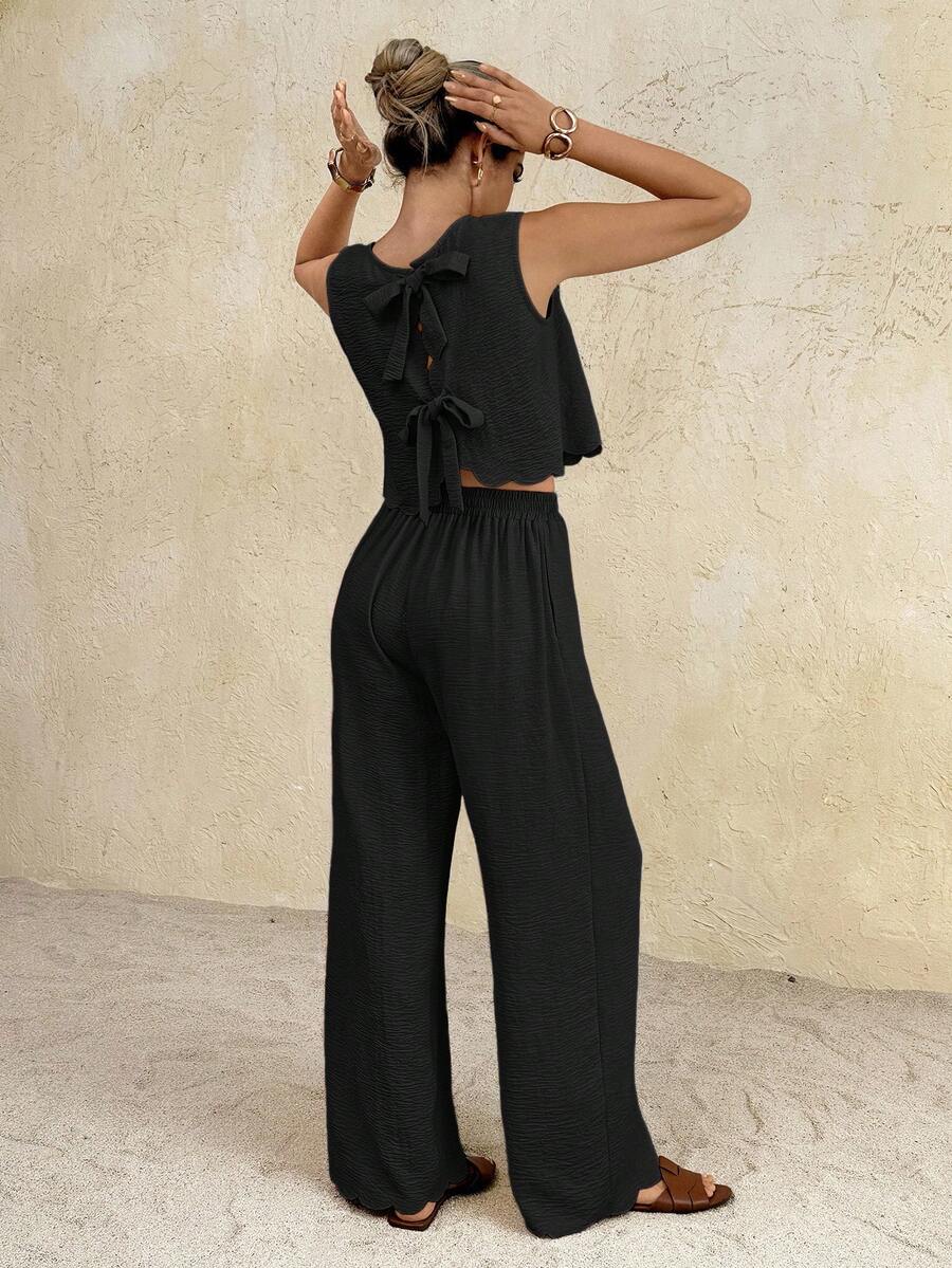 SHEIN Frenchy Bộ đồ nữ màu trơn gồm áo hai dây và quần ống rộng có nơ phía sau, kiểu dáng thường ngày. - màu đen - Xem 1