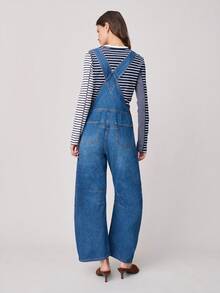 Nöista Denim Overall Features Adjustable Shoulder Straps, A Front Chest Pocket, And Side Button Closures. Relaxed Wide-Leg Fit. Casual, Spring Summer, Woman. - Medium Wash - View 2