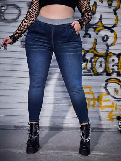 بنطلون جينز جيب مائل خصر مرن مقاس كبير