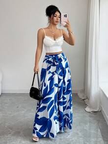 Elenzga 这款女士优雅高腰系带蓝色印花半身裙，尽显精致优雅。适合各种场合，从正式工作装和通勤装，到性感装扮、浪漫法式风、休闲外出、度假、中东复古主题活动、温馨下午茶聚会、魅力派对，以及新年、感恩节、圣诞节、情人节和其他节日庆祝活动。 - 藍白色 - 查看 3