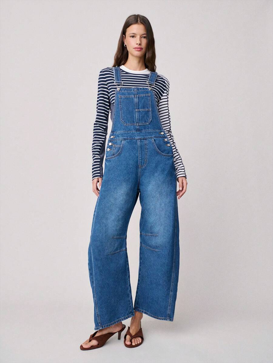 Nöista Denim Overall Features Adjustable Shoulder Straps, A Front Chest Pocket, And Side Button Closures. Relaxed Wide-Leg Fit. Casual, Spring Summer, Woman. - Medium Wash - View 1