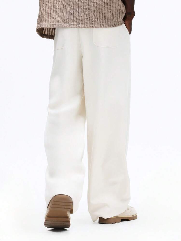 Relaxed Fit Pleated Wide Leg Pants