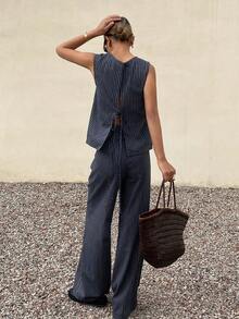 Livesso Bộ 2 món gồm áo hở lưng kẻ sọc và quần dài thường ngày dành cho nữ. - Màu xanh hải quân - Xem 2