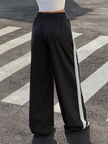 Muchica Women's Black Side-Striped Lace-Up Fitted Loose-Fit Sweatpants; Women's Black Pants; Loose-Fit Pants; Women's Trousers; Black Pants; Women's Sweatpants; Women's Wide-Leg Pants; Women's Black Sweatpants - Black and White - View 2