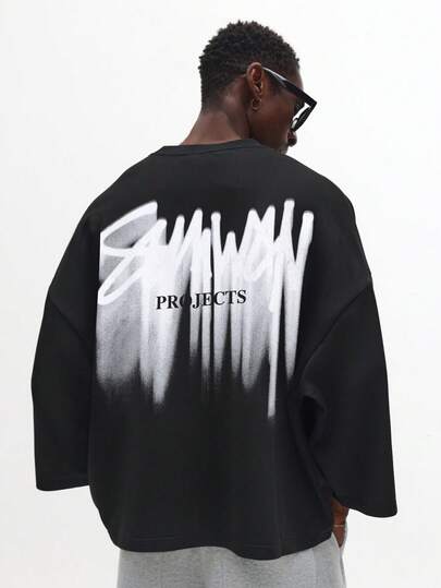 SUMWON Överdimensionerad tröja med sprayfärgat grafiskt tryck och projekttext på baksidan, design på streetwear