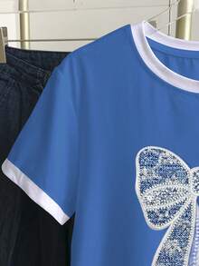 Resyla Áo thun nữ tay ngắn cổ tròn kiểu dáng thường ngày, đính nơ và hạt cườm. - Màu xanh lam - Xem 4